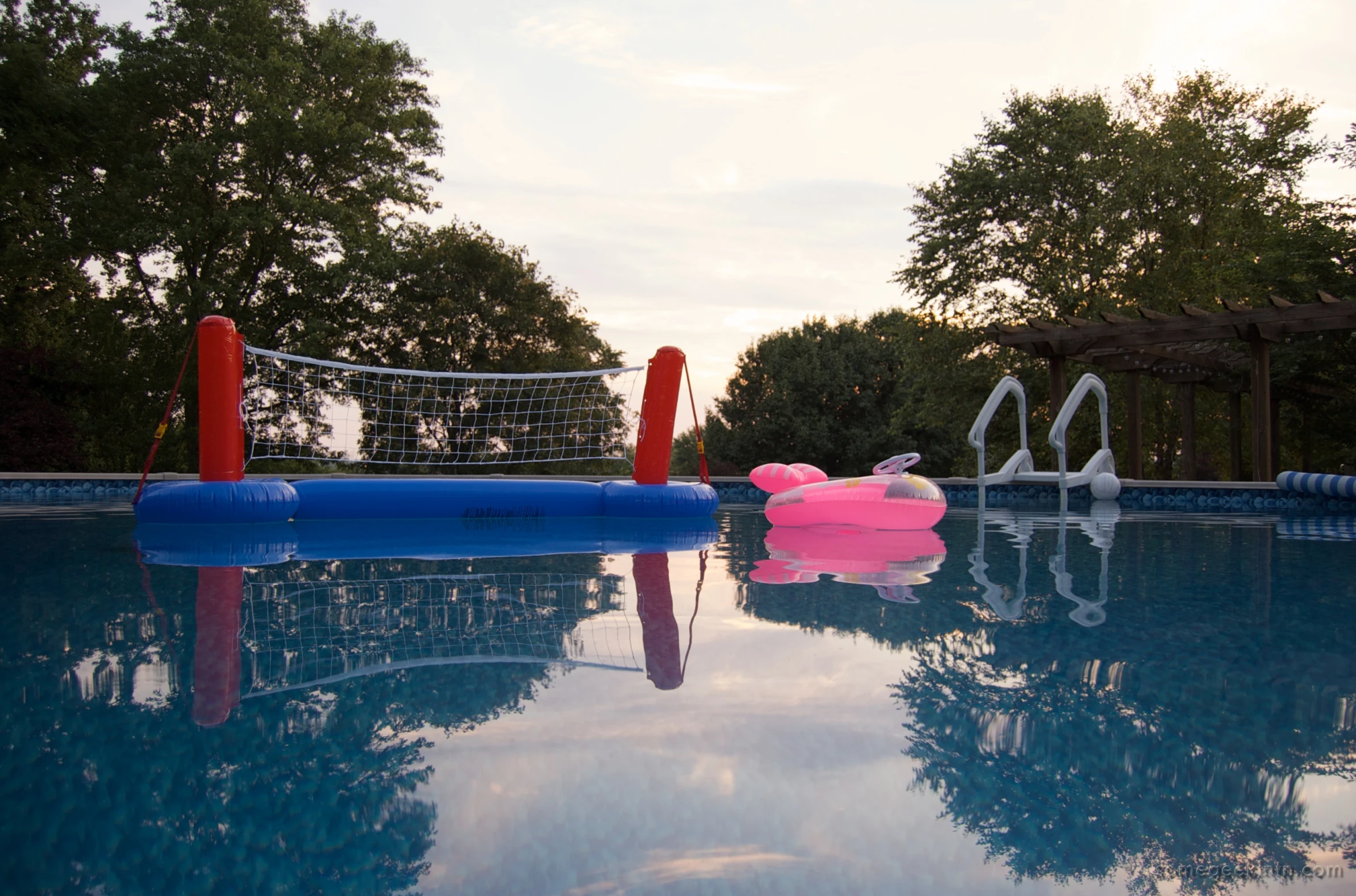 an inflatable float sitting in the middle of a pool