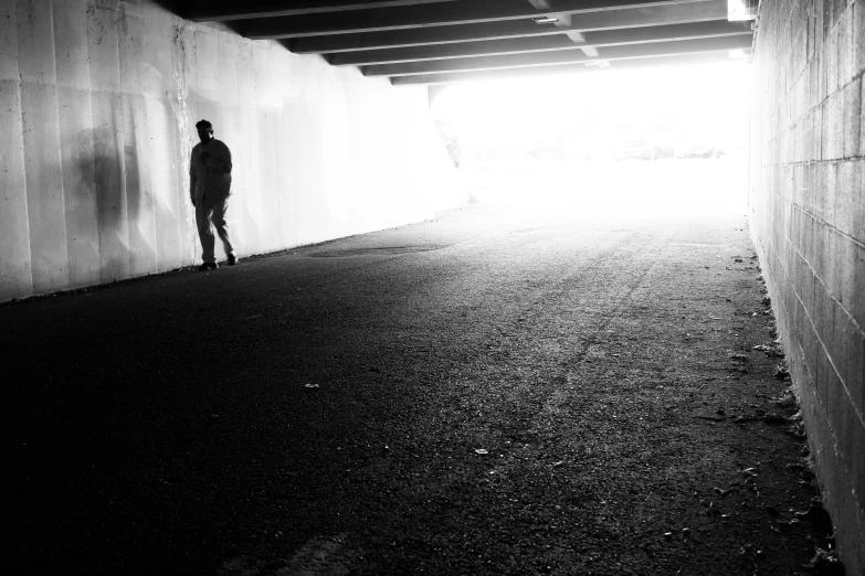 an empty garage with a person in it