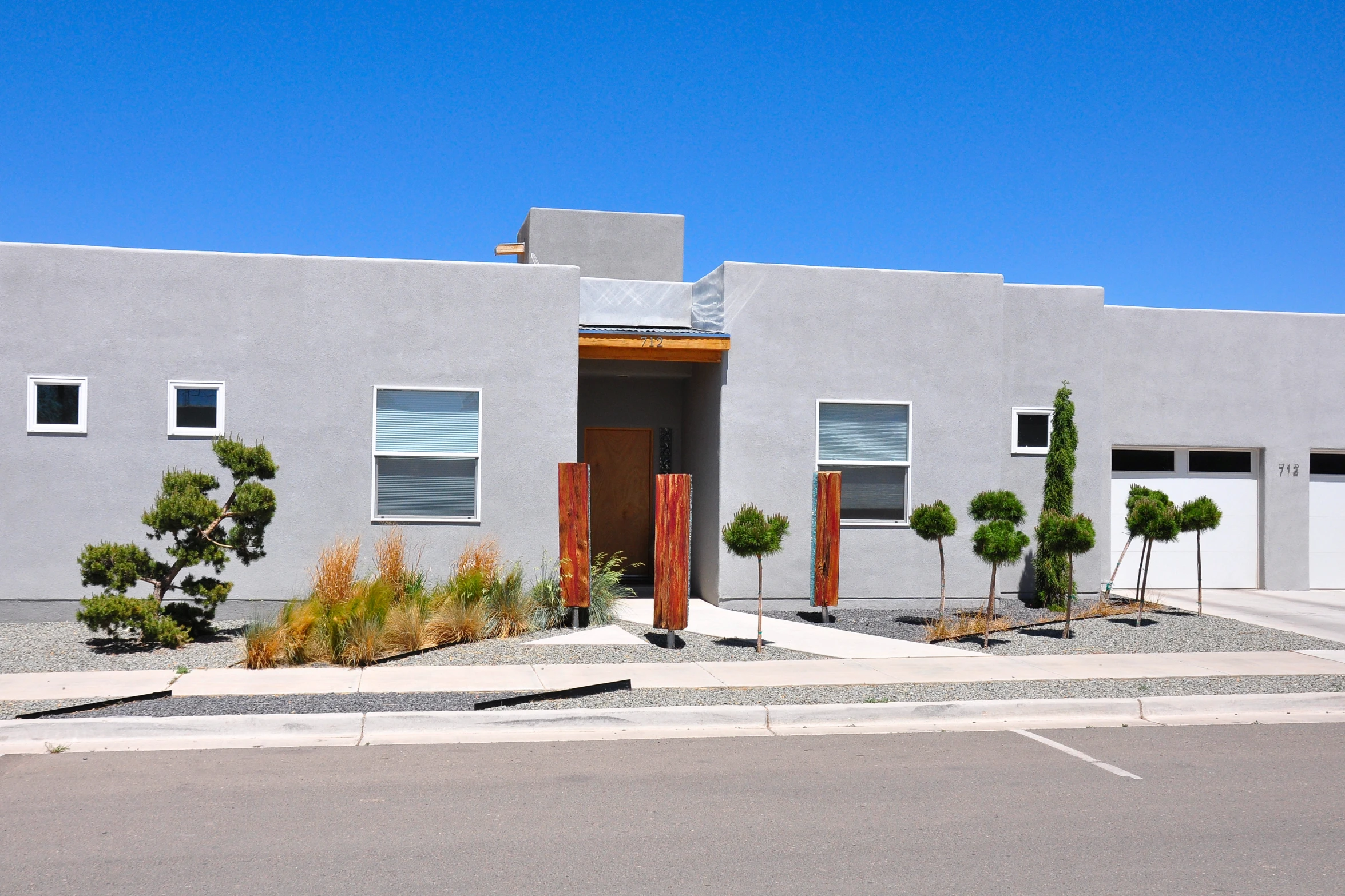 a large building with two garage doors is shown