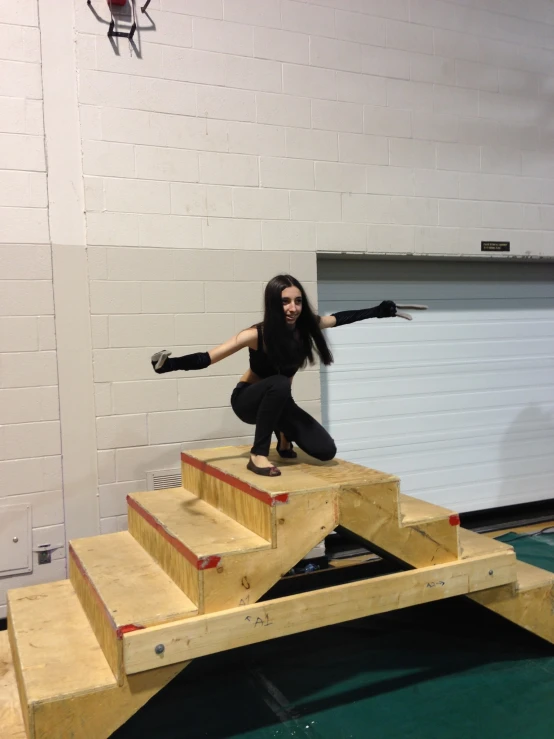 woman on a set of stairs with a handrail