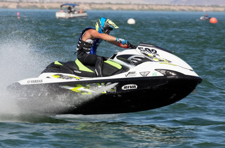 a man is on a jet ski in the water