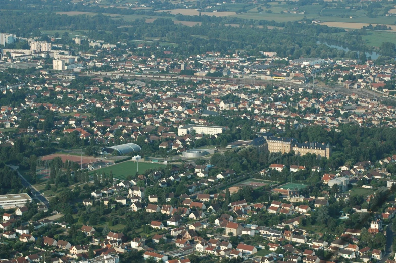 a city that is sitting below some hills