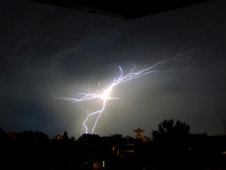 a couple of electrical discharges in the night sky