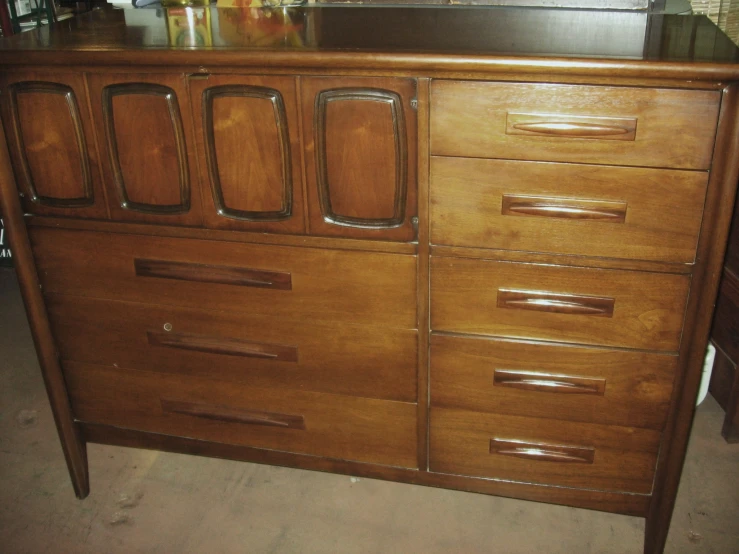 this cabinet has drawers and is made of solid wood