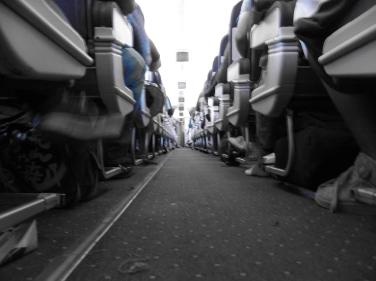 a view down the aisle of a vehicle with no doors