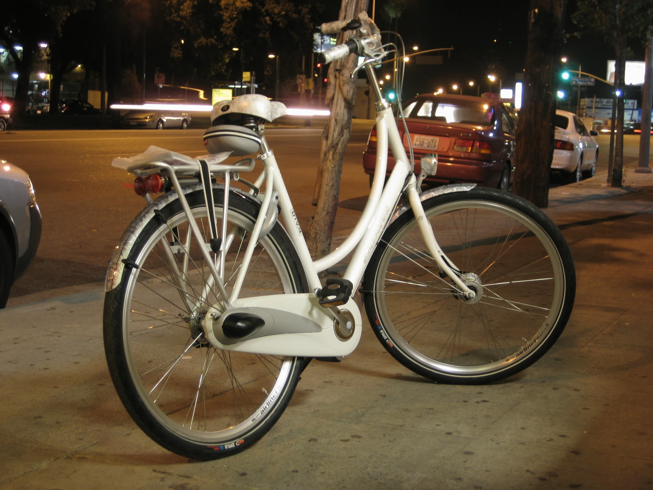 a bicycle on a city street at night