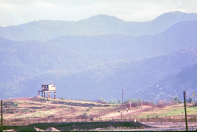 a small house on the side of a mountain