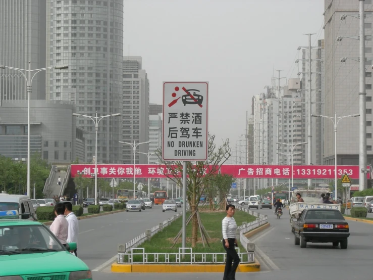 a city street with cars driving on it