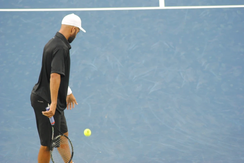 a man playing tennis has an empty tennis court