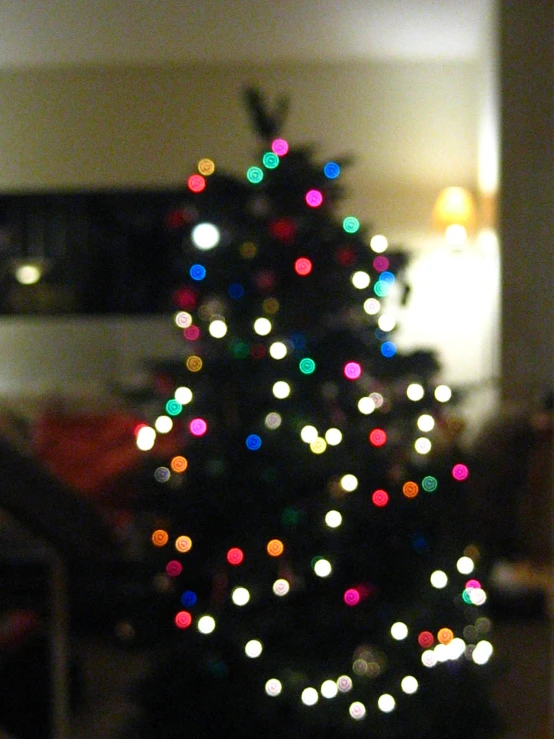 a christmas tree with lights all over it