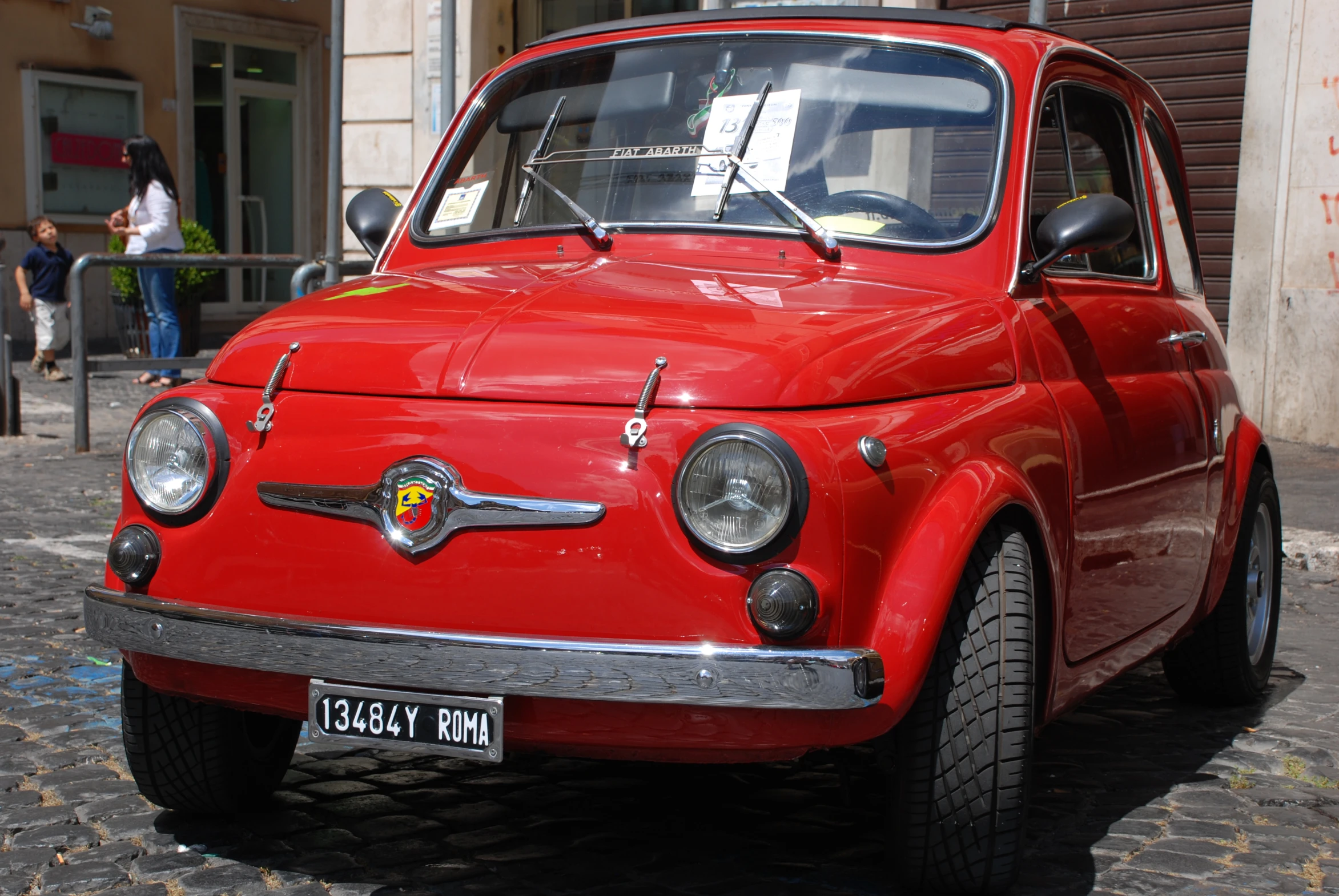 the old style car has a lot of chrome on it