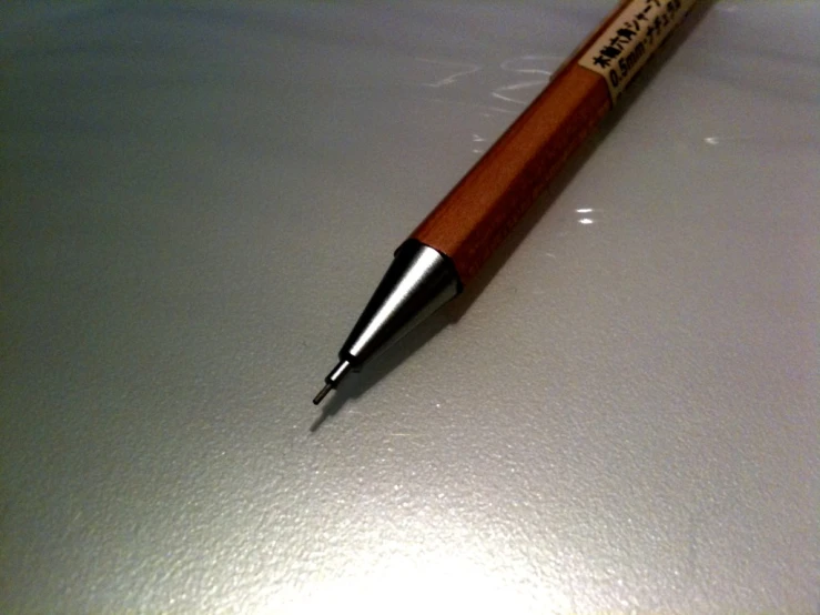 a pen resting on top of a table