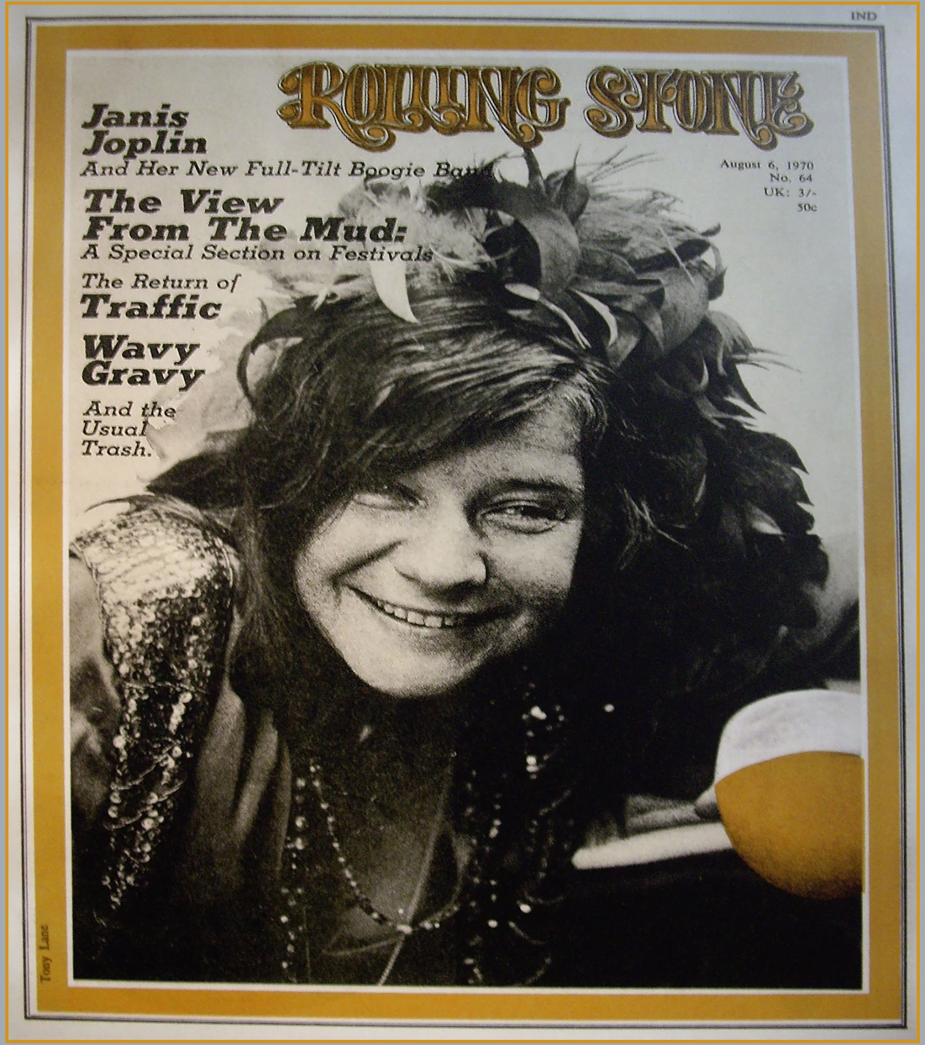 an ad for rolling stone shows a woman with a feathered hat