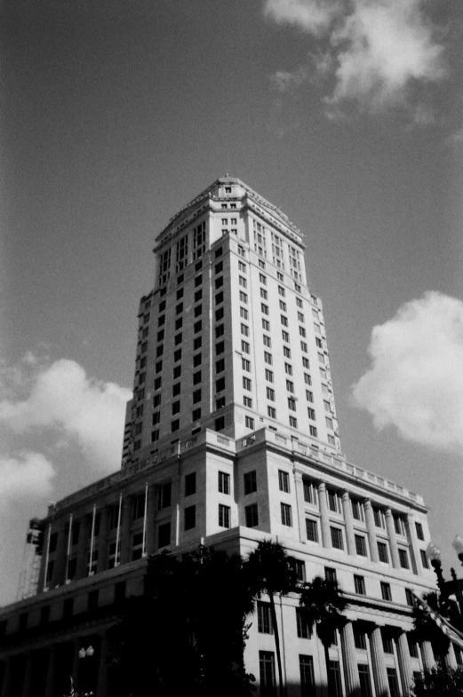 a building with a tall tower and many windows