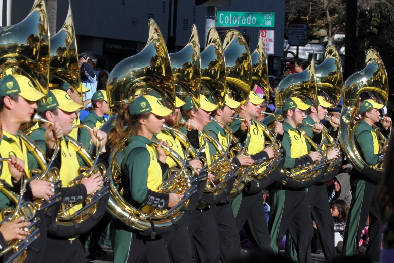 the marching team is marching in the street