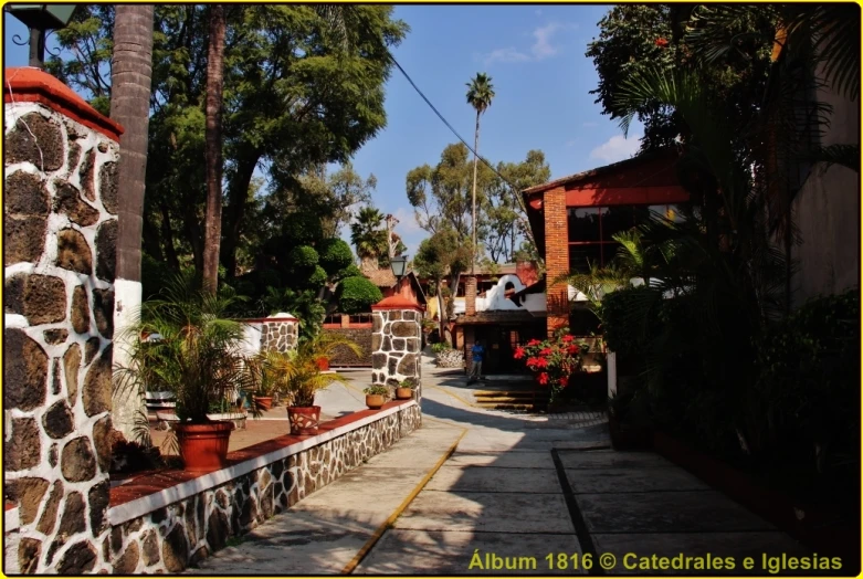 the view down an alley leading into a village