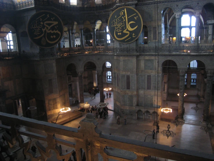 an inside of a very old looking building with lights