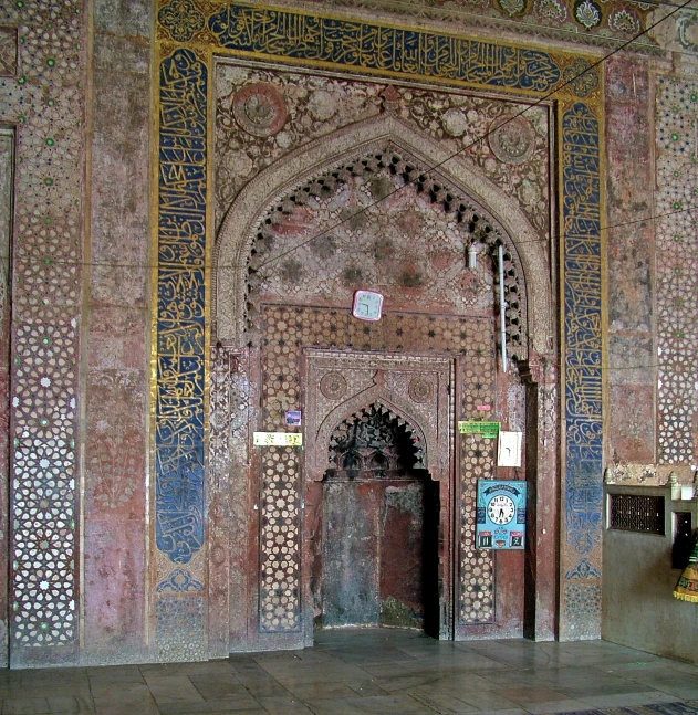 a door inside of a building with lots of decorative designs