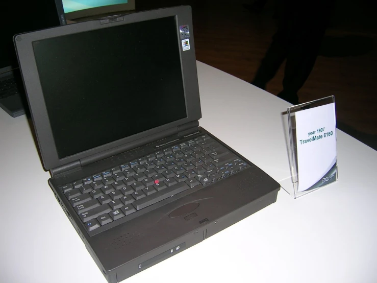a laptop with a dvd, and cd