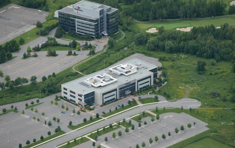 aerial po of an office building and parking lot