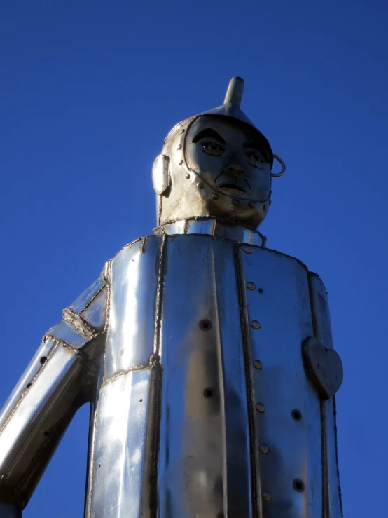 a close up of a metal robot statue