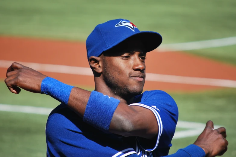 a baseball player is preparing to swing a bat