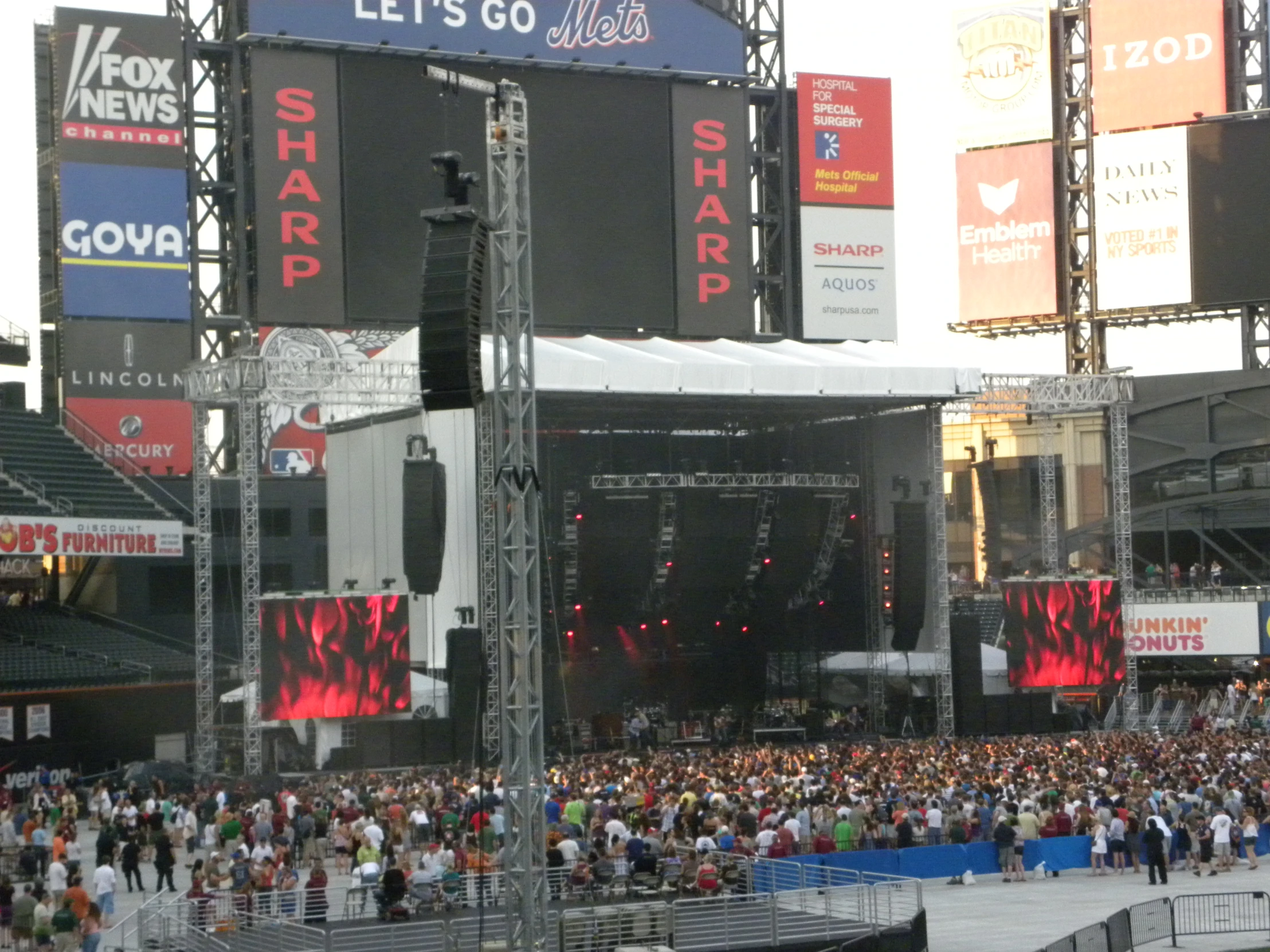 the stadium seats and stands full of people