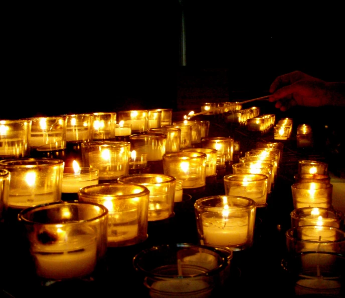 the candles are lit in small, shallow and elegant arrangements