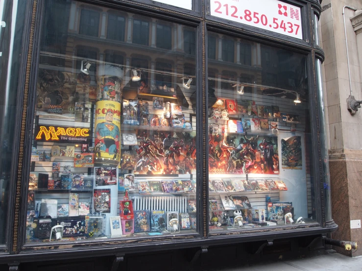 an older store window with lots of pokemon merchandise