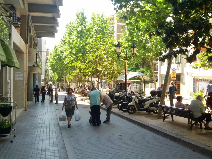 an image of a city square with people walking