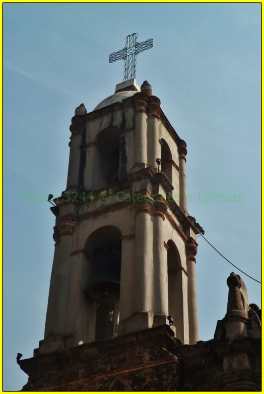 a large clock tower sitting on the side of a building