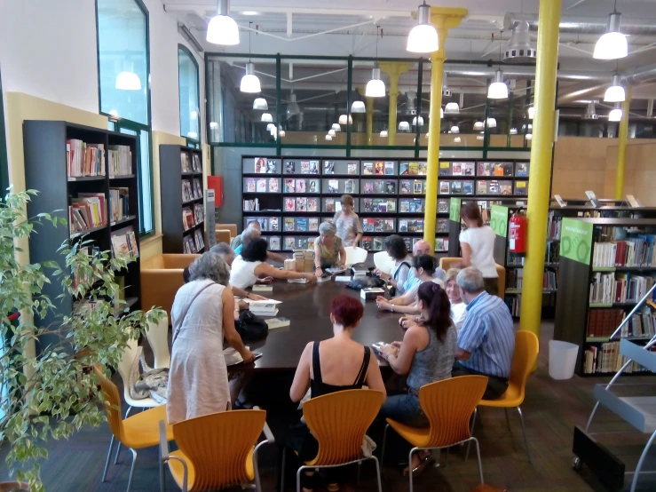 people sitting at the table in a liry