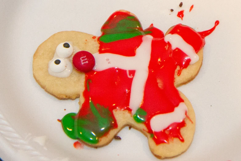 decorated cookies on a white plate on a table