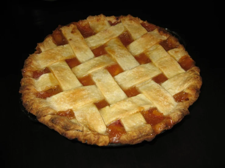 a fruit and vegetable pie on a table