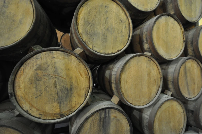 an image of a stack of wine barrels