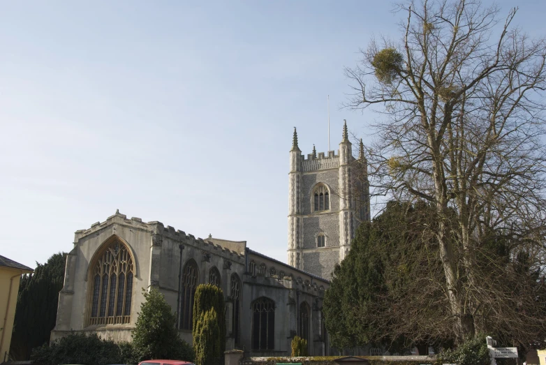 a church with a car parked in front