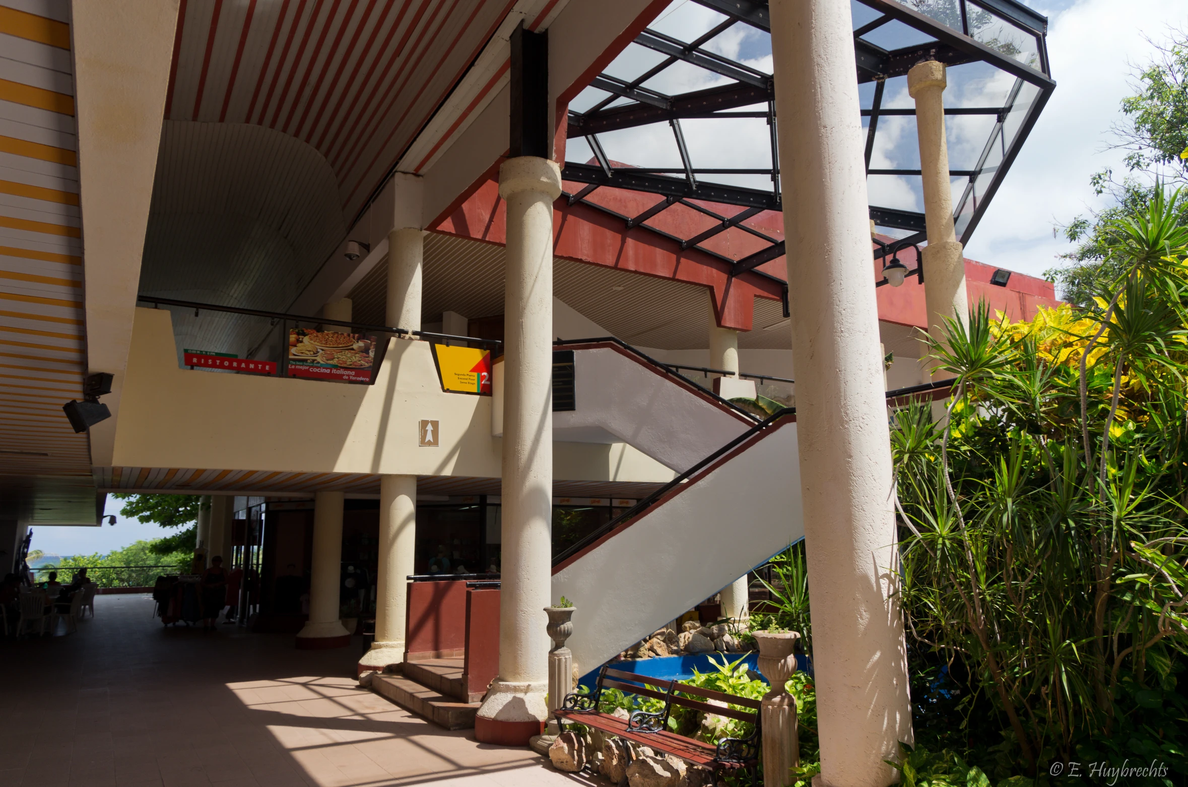 the stairs leading up to an upstairs balcony