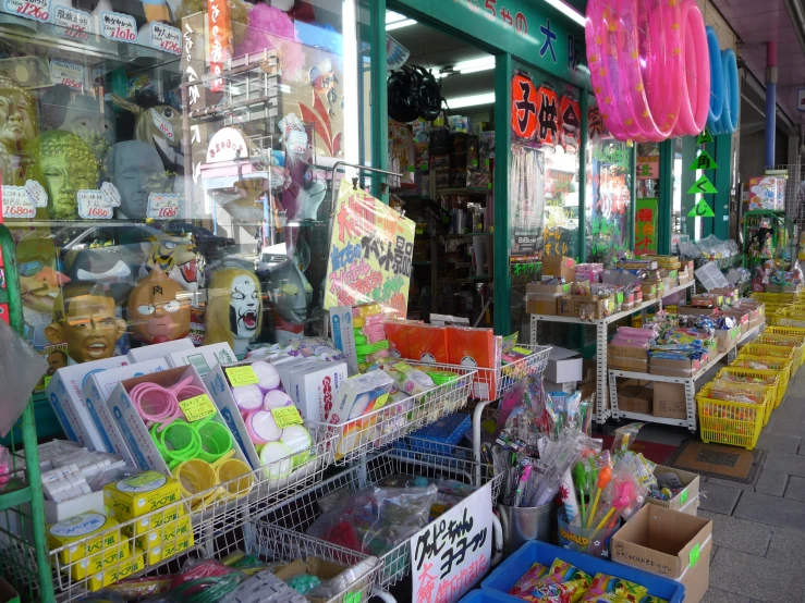 a row of store shelves filled with lots of different kinds of goods