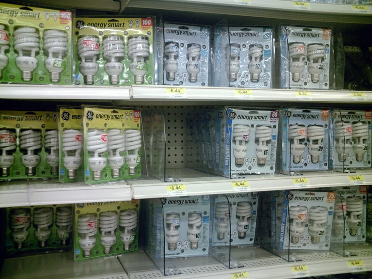 rows of packaged toilet heads are stacked on shelves
