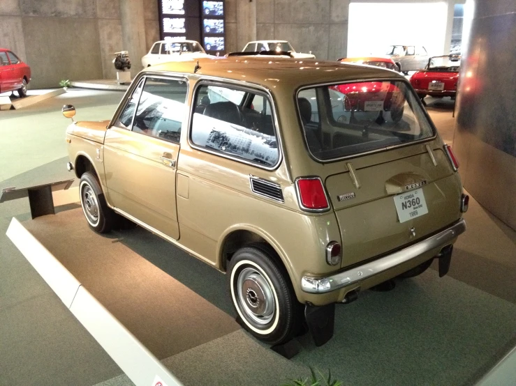 an old style car in a show room