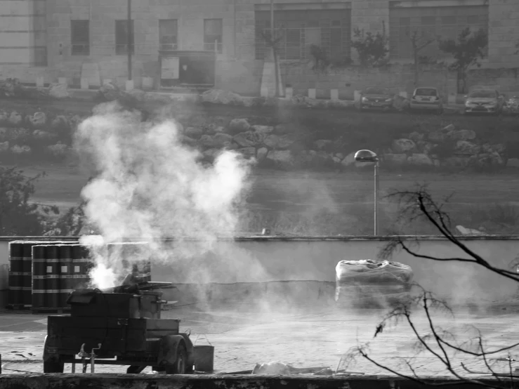 a man stands by some kind of industrial  springs