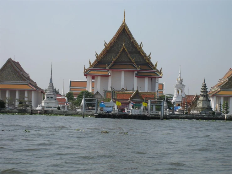 a row of buildings with multiple spires on top