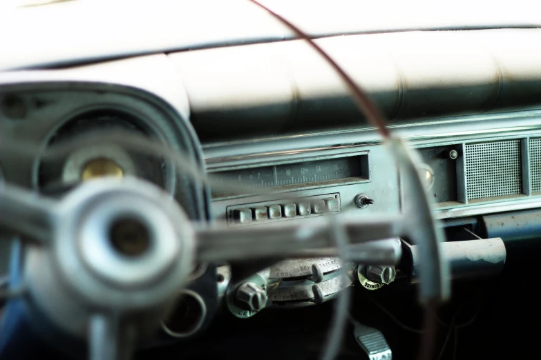 the dash panel of a car with several wires