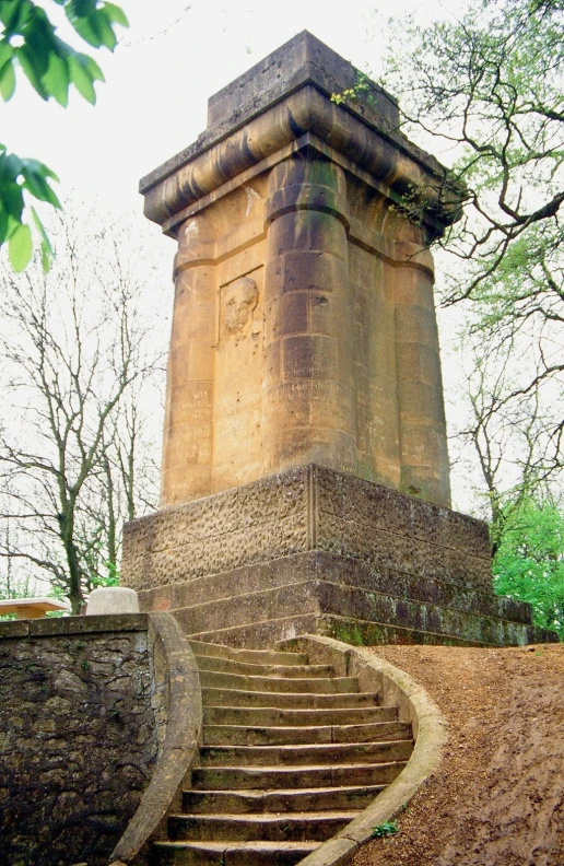 a brick building with stairs leading up to the top