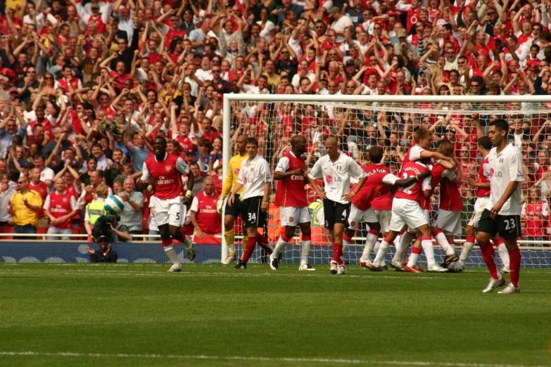 soccer players on a field during a game