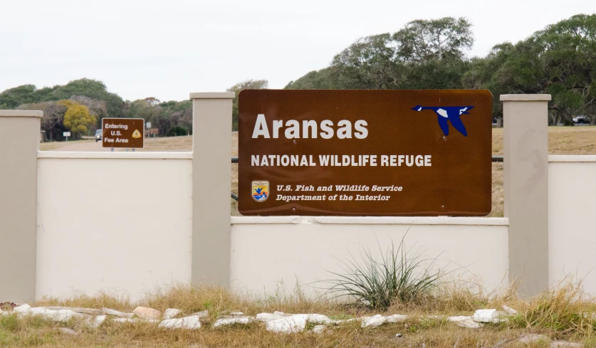 a large sign with an area in the background