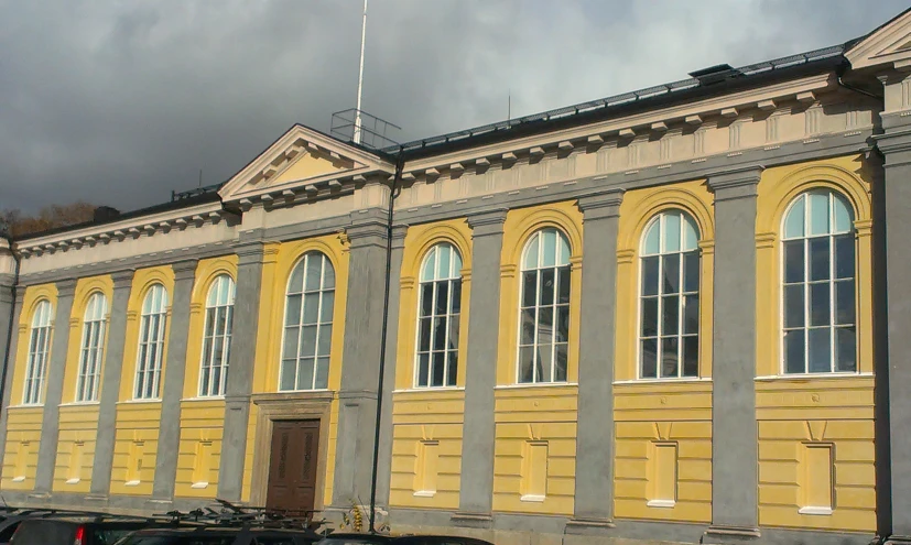 there is an old building with a flag on top