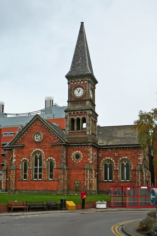 a church with a large clock on the side of it