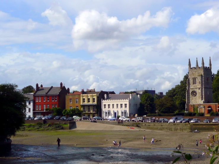 a large building and the town is near the water