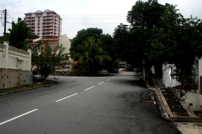 a very empty street on an overcast day